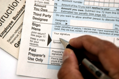 Accountant using Tax form